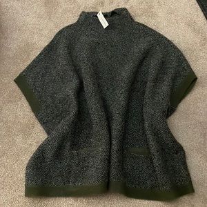 Francesca’s olive green sweater poncho